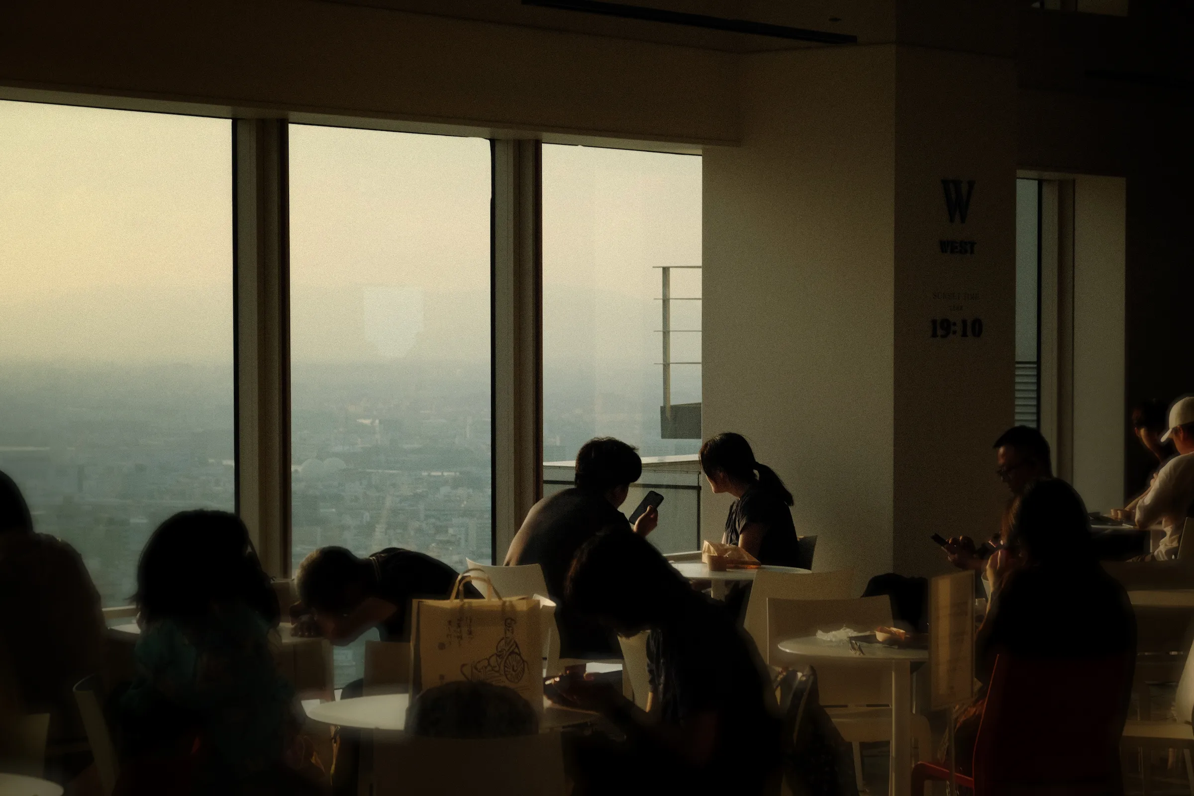 people sitting with skyline